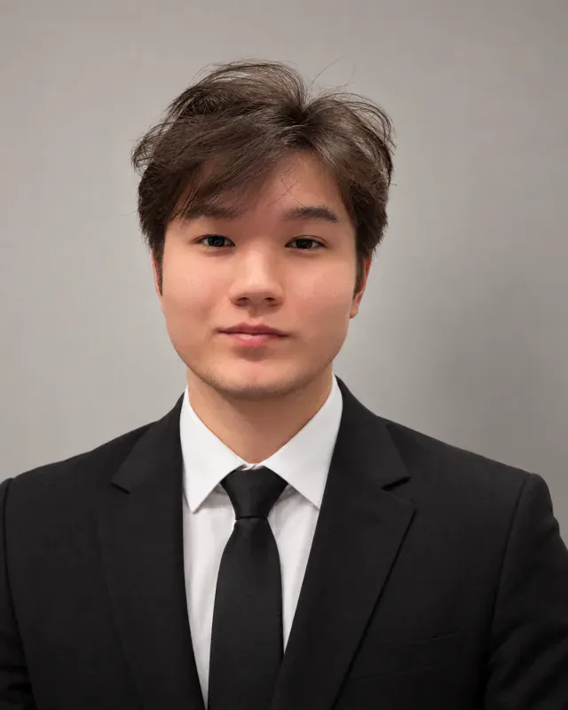 Yerdaulet Damir in a suit